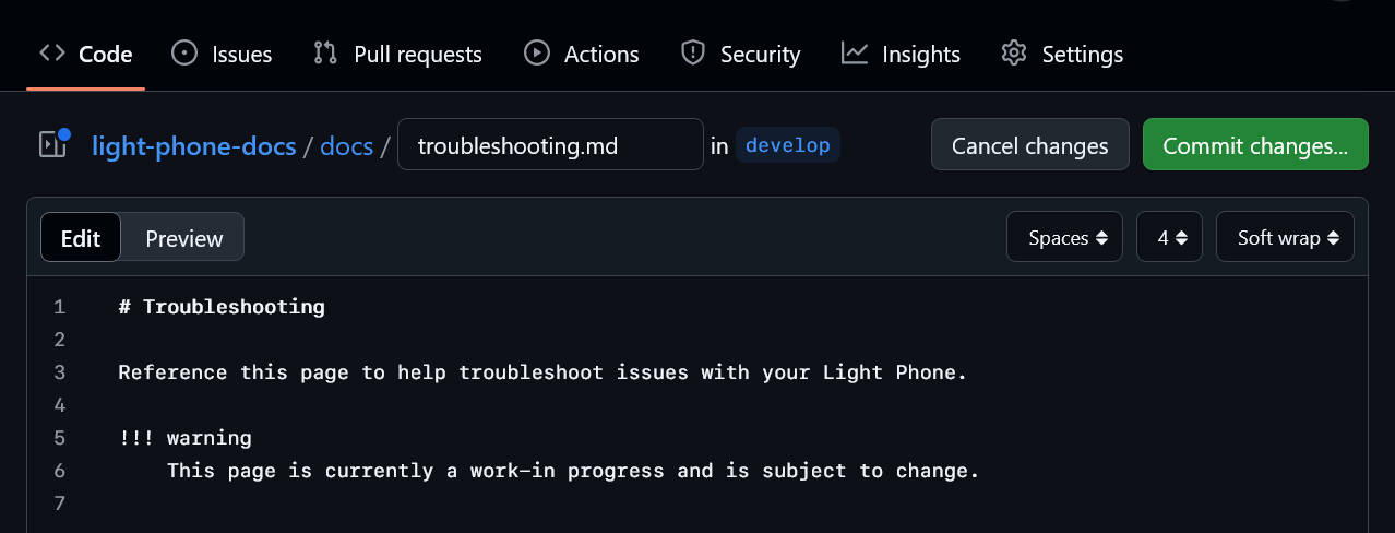 The 'troubleshooting.md' file showing the 'Commit changes' option.